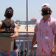Image for article titled Watch a pair of friendly bros brave numerous bad vibes in attempt to hand out free masks